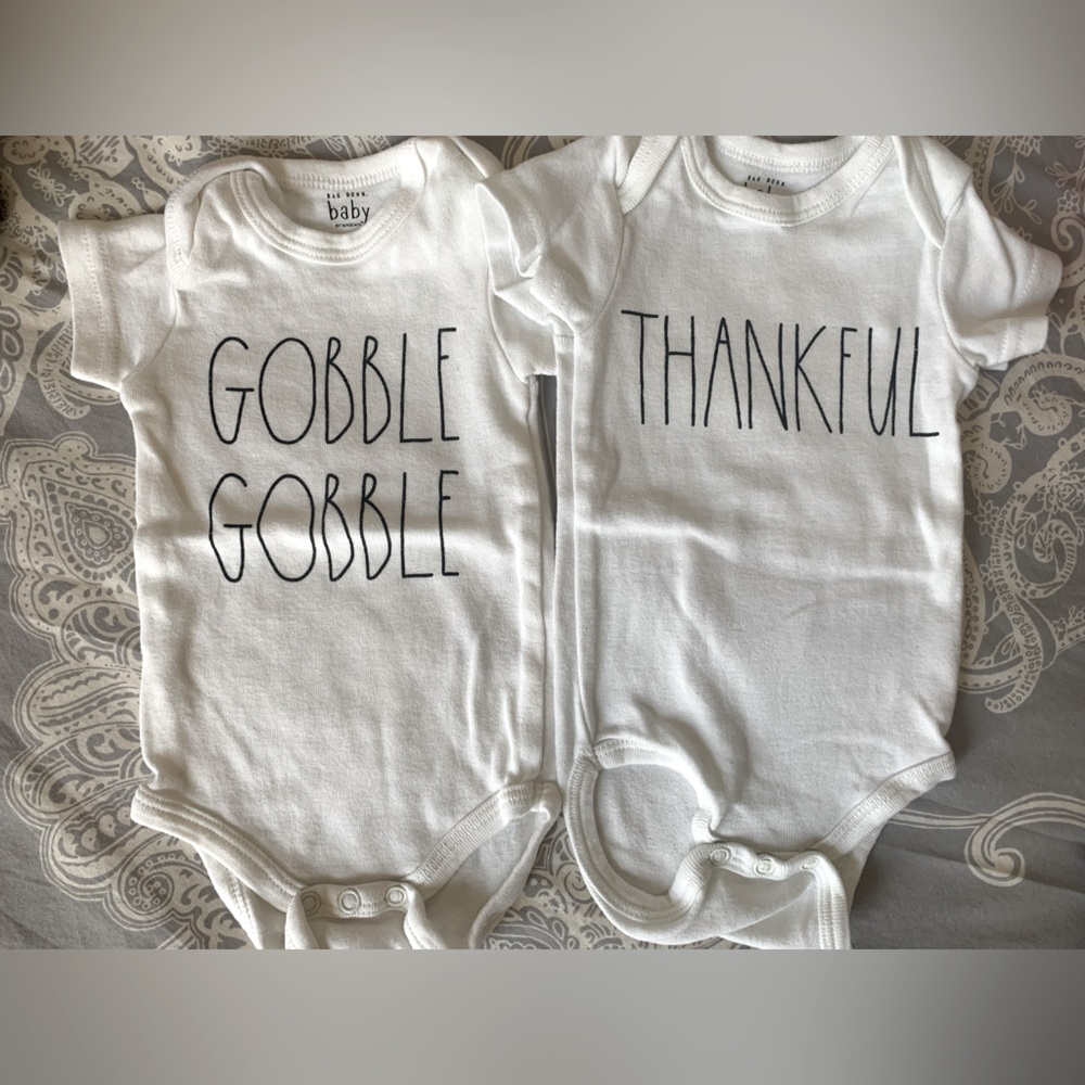 Pair of Rae Dunn Thanksgiving baby onesies